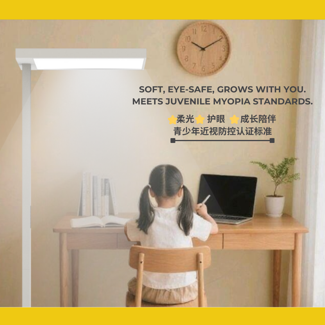 Child sitting at a desk with a laptop, illuminated by a standing lamp, with text about eye safety and juvenile myopia standards.